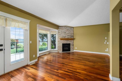 35 Prominence Path Sw, Calgary, AB - Indoor With Fireplace