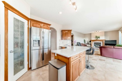 75 Hampstead Way Nw, Calgary, AB - Indoor Photo Showing Other Room With Fireplace
