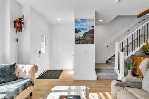 7 Emberside Park, Cochrane, AB - Indoor Photo Showing Living Room