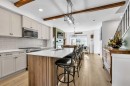 7 Emberside Park, Cochrane, AB  - Indoor Photo Showing Kitchen With Upgraded Kitchen 