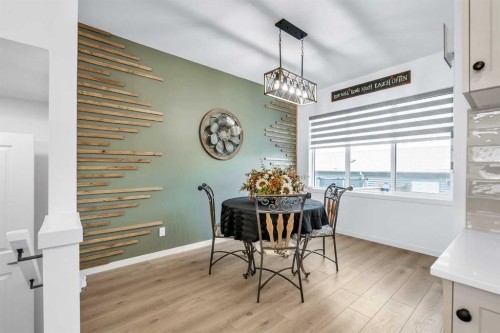 7 Emberside Park, Cochrane, AB - Indoor Photo Showing Dining Room