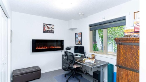 340 Legacy Point Se, Calgary, AB - Indoor Photo Showing Office With Fireplace
