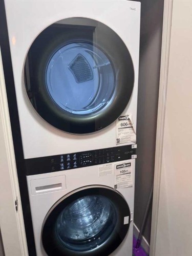 105-106 Stewart Creek Landing, Canmore, AB - Indoor Photo Showing Laundry Room