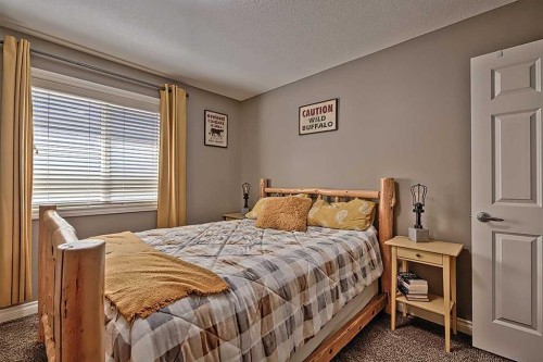 732 Hampton Hills Drive Ne, High River, AB - Indoor Photo Showing Bedroom