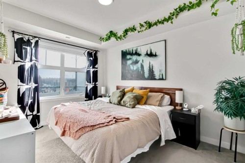 208-255 Les Jardins Park Se, Calgary, AB - Indoor Photo Showing Bedroom