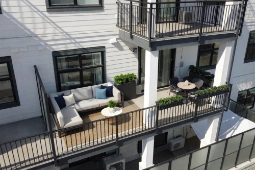 208-255 Les Jardins Park Se, Calgary, AB - Outdoor With Balcony With Exterior