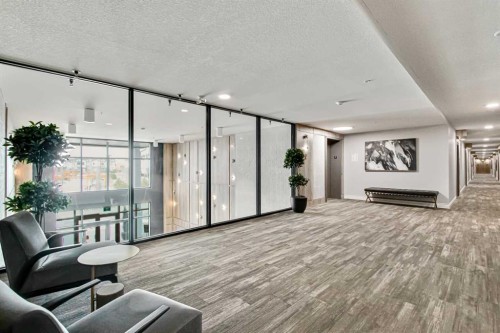 208-255 Les Jardins Park Se, Calgary, AB - Indoor Photo Showing Other Room