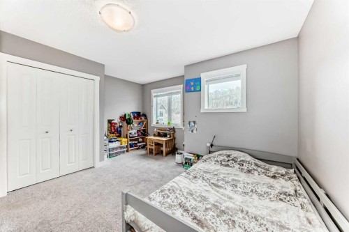 49 Aspen Hills Drive Sw, Calgary, AB - Indoor Photo Showing Bedroom