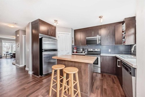 49 Aspen Hills Drive Sw, Calgary, AB - Indoor Photo Showing Kitchen With Upgraded Kitchen