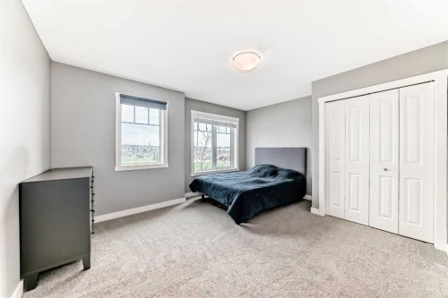 49 Aspen Hills Drive Sw, Calgary, AB - Indoor Photo Showing Bedroom