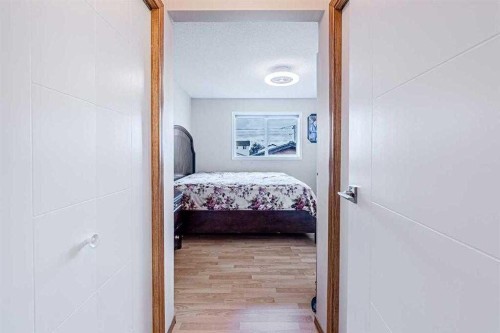65 Martinvalley Road Ne, Calgary, AB - Indoor Photo Showing Bedroom