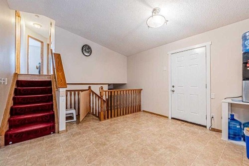 65 Martinvalley Road Ne, Calgary, AB - Indoor Photo Showing Other Room
