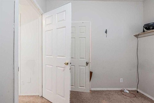 65 Martinvalley Road Ne, Calgary, AB - Indoor Photo Showing Other Room