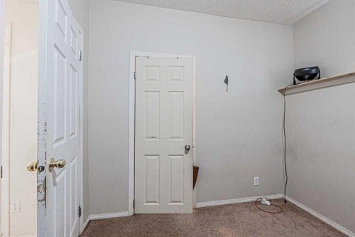 65 Martinvalley Road Ne, Calgary, AB - Indoor Photo Showing Other Room