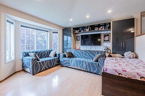 65 Martinvalley Road Ne, Calgary, AB - Indoor Photo Showing Bedroom