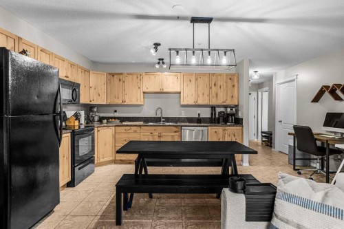 111-300 Palliser, Canmore, AB - Indoor Photo Showing Kitchen