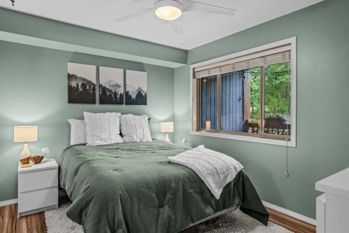 111-300 Palliser, Canmore, AB - Indoor Photo Showing Bedroom