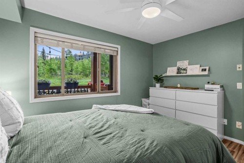 111-300 Palliser, Canmore, AB - Indoor Photo Showing Bedroom