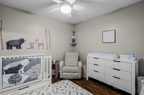 111-300 Palliser, Canmore, AB - Indoor Photo Showing Bedroom