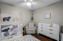 111-300 Palliser, Canmore, AB  - Indoor Photo Showing Bedroom 