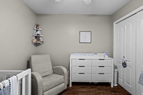 111-300 Palliser, Canmore, AB - Indoor Photo Showing Bedroom