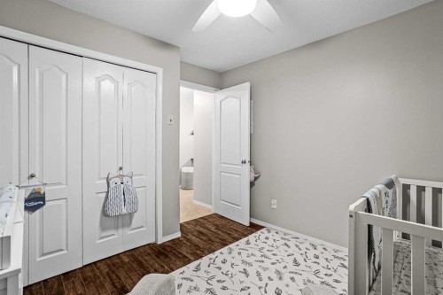 111-300 Palliser, Canmore, AB - Indoor Photo Showing Bedroom
