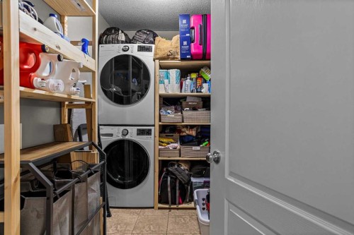 111-300 Palliser, Canmore, AB - Indoor Photo Showing Laundry Room