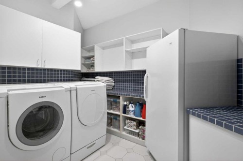 523 Scimitar Bay Nw, Calgary, AB - Indoor Photo Showing Laundry Room