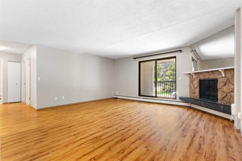 3101-4001C 49 Street Nw, Calgary, AB - Indoor With Fireplace