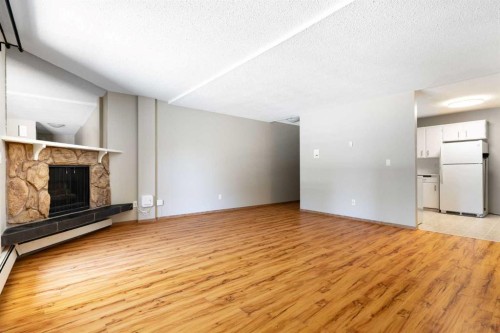 3101-4001C 49 Street Nw, Calgary, AB - Indoor With Fireplace