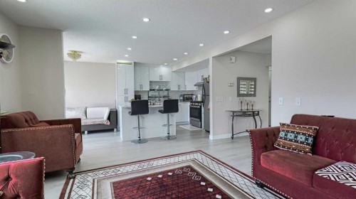 54 Saddlecreek Crescent Ne, Calgary, AB - Indoor Photo Showing Living Room