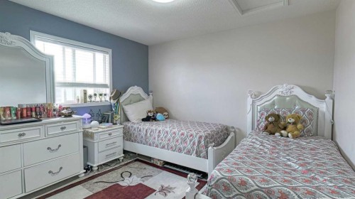 54 Saddlecreek Crescent Ne, Calgary, AB - Indoor Photo Showing Bedroom