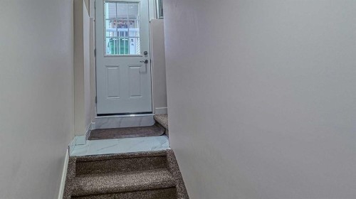 54 Saddlecreek Crescent Ne, Calgary, AB - Indoor Photo Showing Other Room
