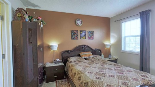 54 Saddlecreek Crescent Ne, Calgary, AB - Indoor Photo Showing Bedroom