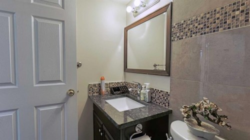54 Saddlecreek Crescent Ne, Calgary, AB - Indoor Photo Showing Bathroom