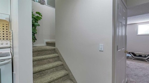 54 Saddlecreek Crescent Ne, Calgary, AB - Indoor Photo Showing Other Room
