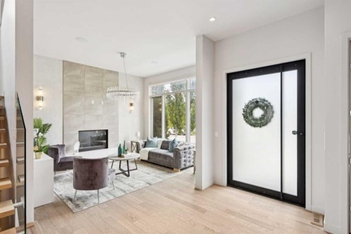 423 7A Street Ne, Calgary, AB - Indoor With Fireplace