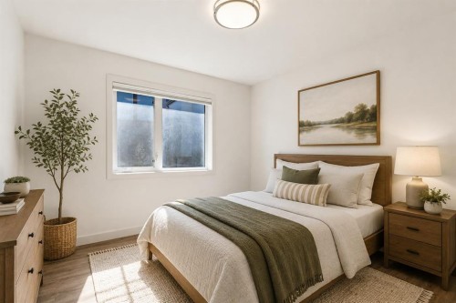 423 7A Street Ne, Calgary, AB - Indoor Photo Showing Bedroom