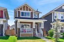218 River Heights Green, Cochrane, AB  - Outdoor With Deck Patio Veranda With Facade 