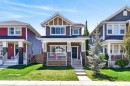 218 River Heights Green, Cochrane, AB  - Outdoor With Deck Patio Veranda With Facade 