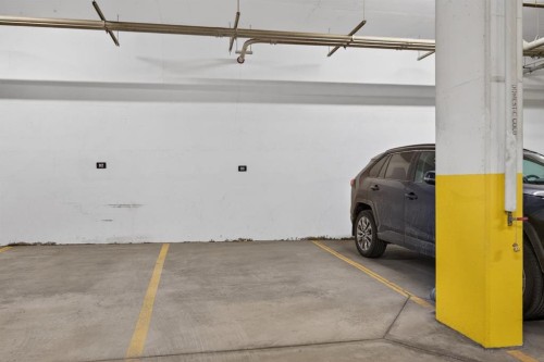216-238 Sage Valley Common Nw, Calgary, AB - Indoor Photo Showing Garage