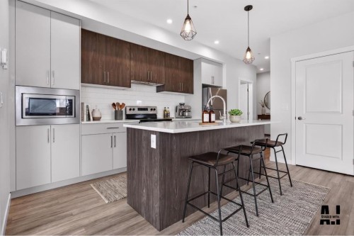 216-238 Sage Valley Common Nw, Calgary, AB - Indoor Photo Showing Kitchen With Upgraded Kitchen
