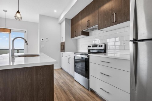216-238 Sage Valley Common Nw, Calgary, AB - Indoor Photo Showing Kitchen With Upgraded Kitchen