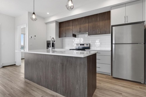 216-238 Sage Valley Common Nw, Calgary, AB - Indoor Photo Showing Kitchen With Upgraded Kitchen