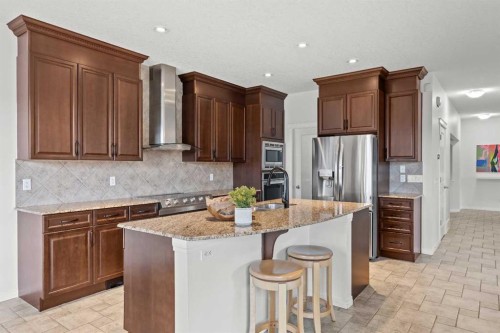 318 Coopers Drive Sw, Airdrie, AB - Indoor Photo Showing Kitchen With Upgraded Kitchen