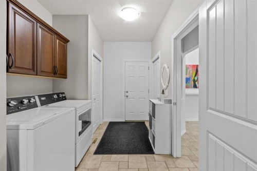 318 Coopers Drive Sw, Airdrie, AB - Indoor Photo Showing Laundry Room