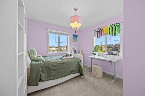 318 Coopers Drive Sw, Airdrie, AB - Indoor Photo Showing Bedroom