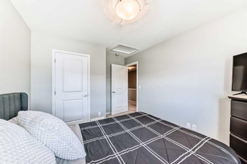 984 Seton Circle Se, Calgary, AB - Indoor Photo Showing Bedroom