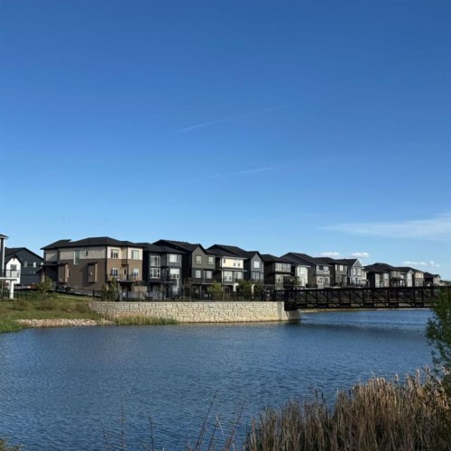 51 Midgrove Drive Sw, Airdrie, AB - Outdoor With Body Of Water