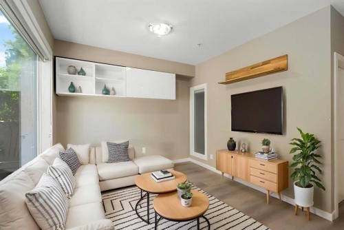 316-93 34 Avenue Sw, Calgary, AB - Indoor Photo Showing Living Room